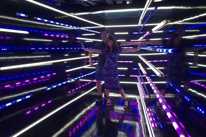 Guests inside the neon-lit Great Big Story infinity room at SXSW