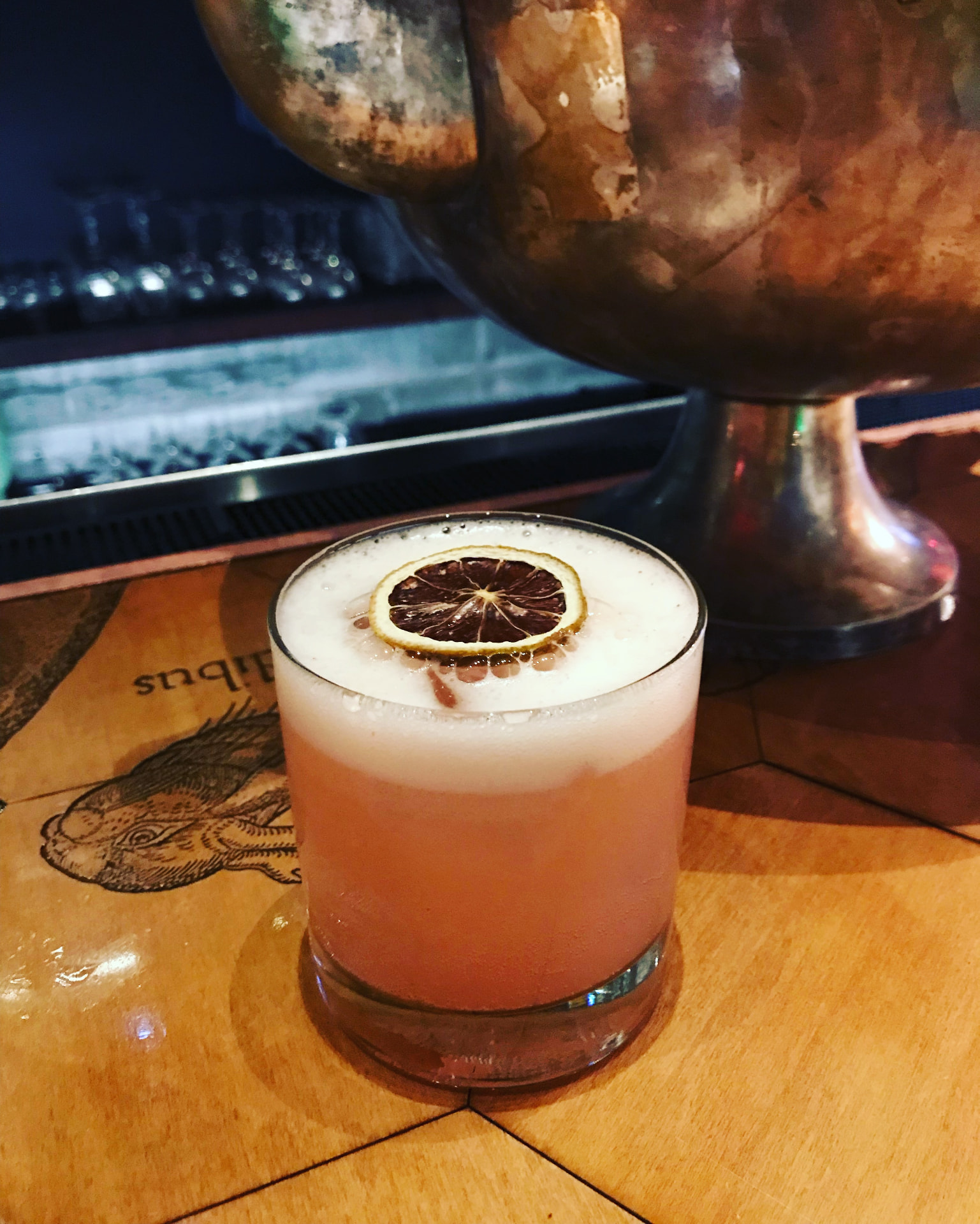 Signature cocktail served at the Octopus × UK Government executive salon